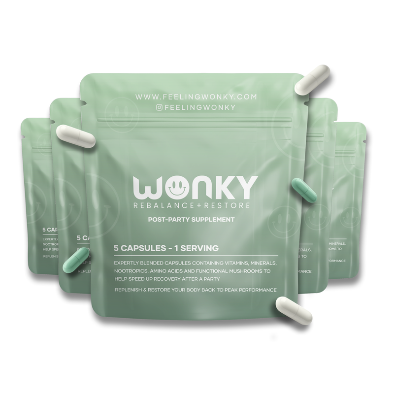 Green supplement packages with capsules labeled Feeling Wonky on a white background